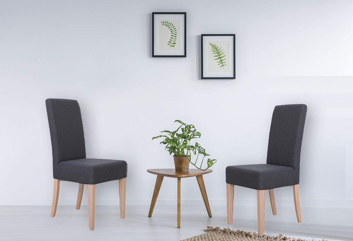 Δύο καρέκλες Face σε ένα δωματιο με γκρί τοίχο